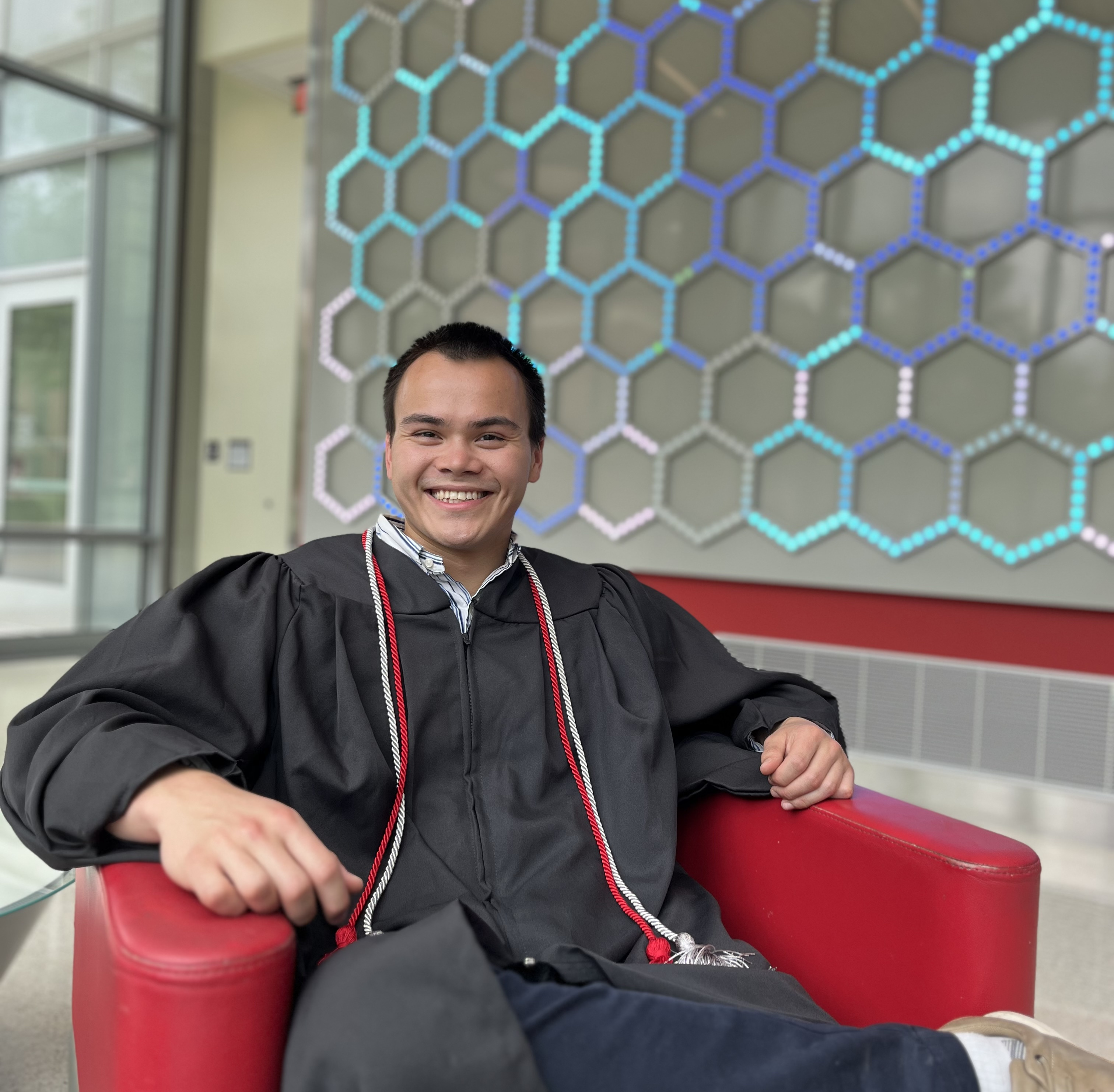 Devin in graduation gown